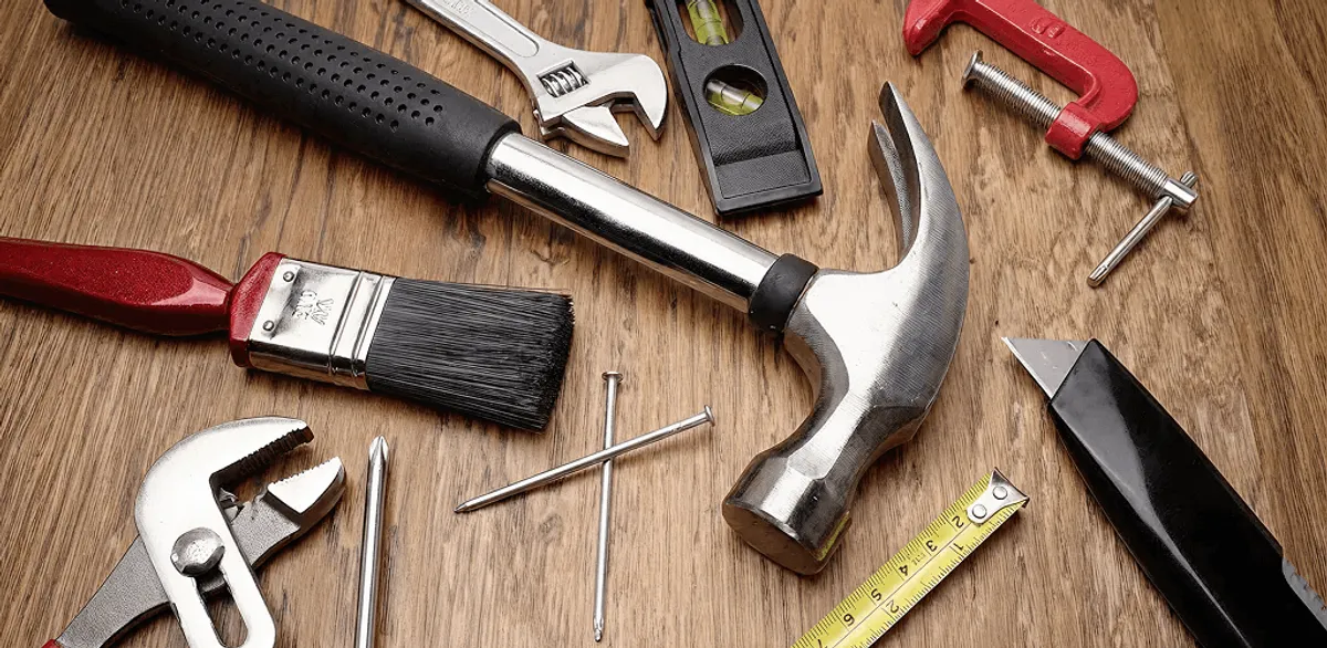 Handyman tools laid out for home repair and maintenance work in Atlanta, GA