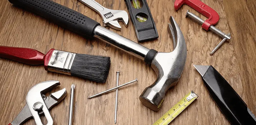 Handyman tools laid out for home repair and maintenance work in Atlanta, GA